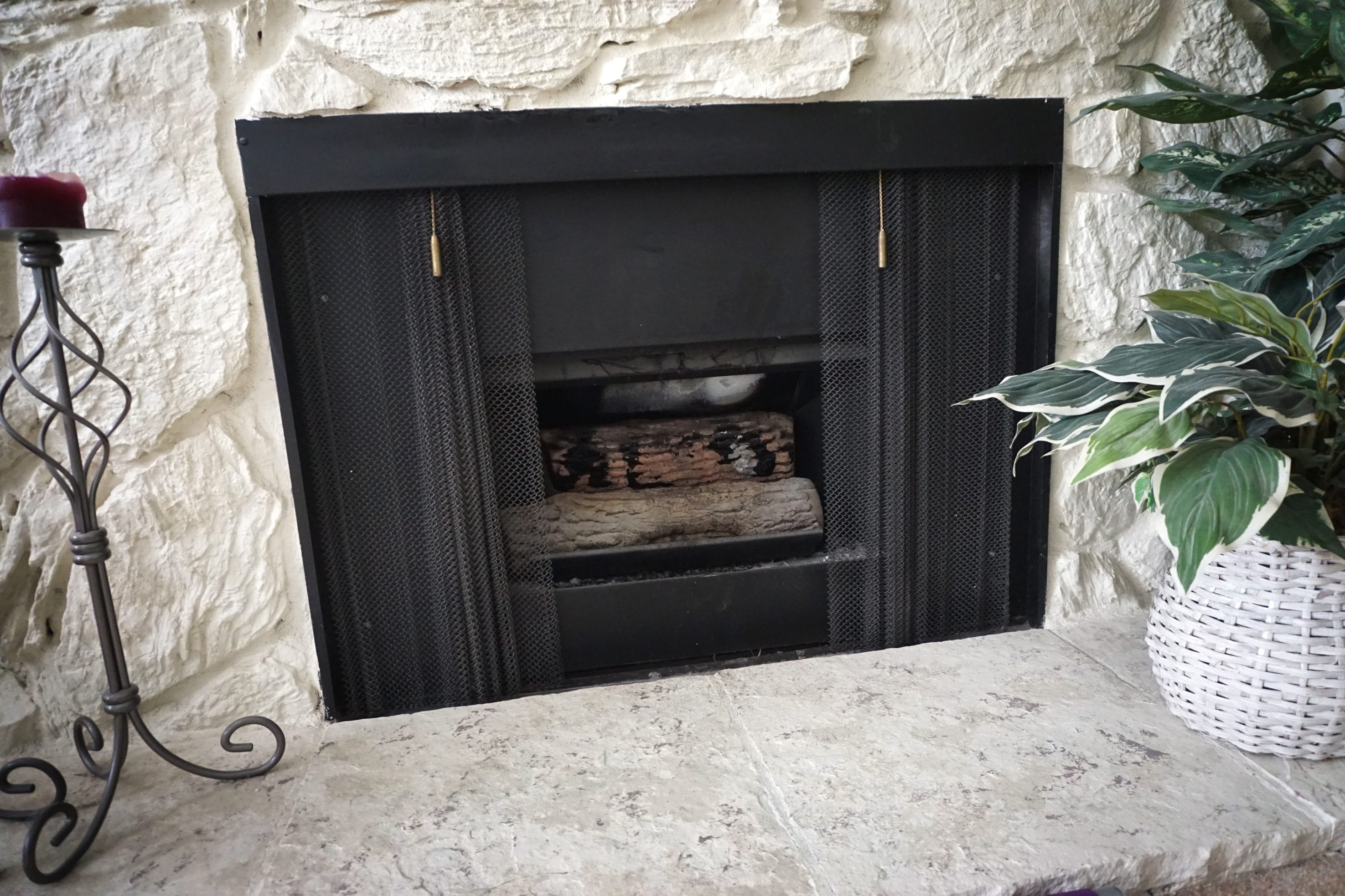 Stock image of a gas log set in between use.