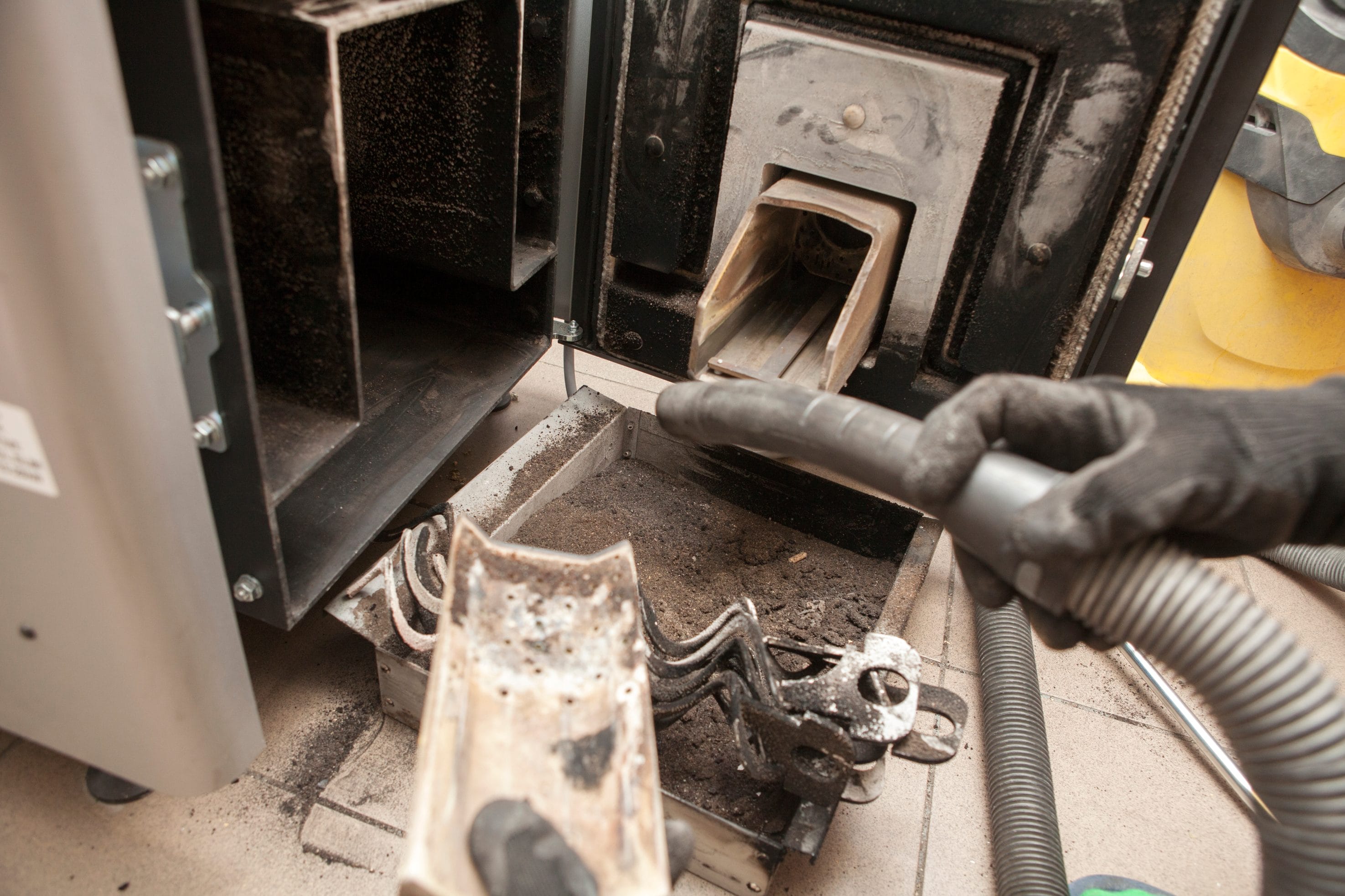 A pellet stove is inspected.